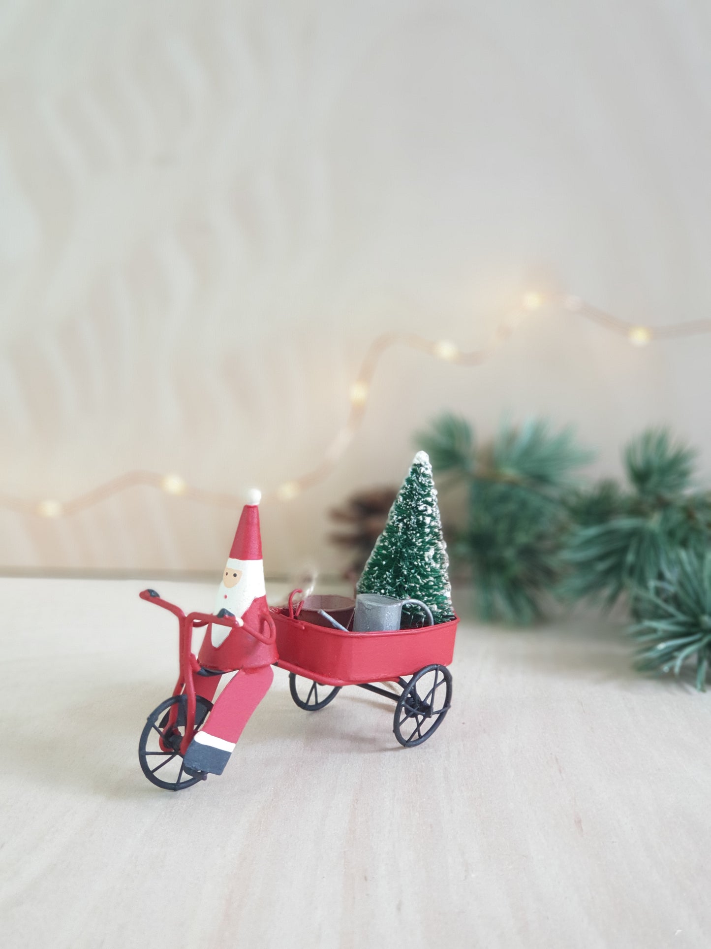Santa on Bike with Christmas Tree and Watering Can Decoration