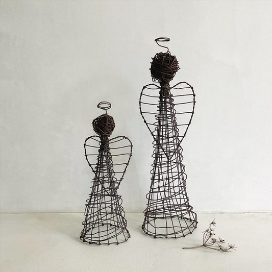 Rusty wire standing angel